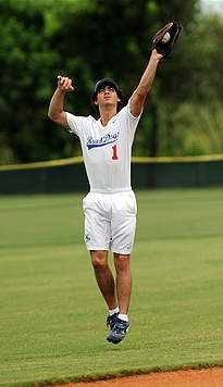  Playing softball.