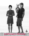 robert and kristen with their baby in the beach - twilight-series fan art