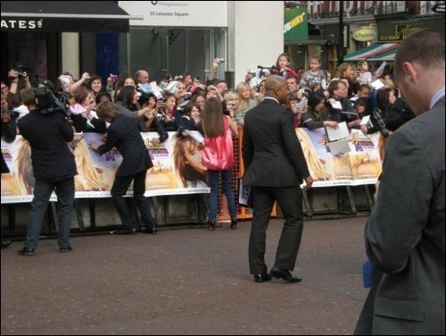 Maddie at the Hannah Montana London Premiere signing autographs