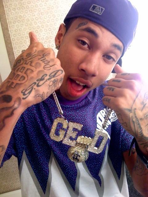 Do you think Tyga would look better without all his tattoos
