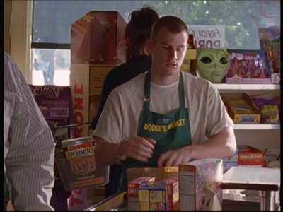  What is the name of the new bag boy that Lorelai thinks is out to get Dean's job while he's away?