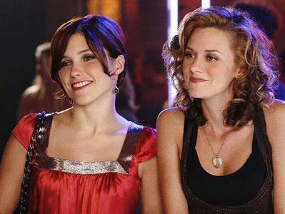 Season 5: What did Peyton answer when Brooke asked what did they get (when they were locked in the library and they ordered Pizza)