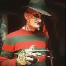 in Freddys nightmare's what kind of vechicle did Freddy drive before he was tourched in the series?