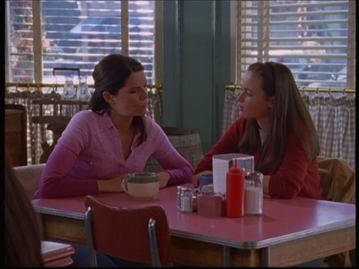  What CD does Rory find under the front نشست of Lorelai's car?