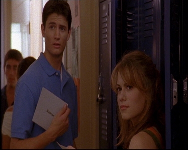  Who are Nathan and Haley looking at in this scene?