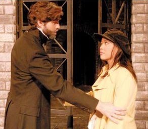  When Eponine gives Valjean Marius's letter to Cosette, where does she say the barricade is?