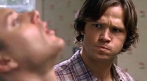  In "Mystery Spot", what is the colour of Sam's toothbrush?