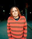  What does Shaun morgan have tattooed on his right arm below his elbow?
