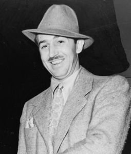  Fashion In Films - Walt Disney is wearing an outfit from which year?