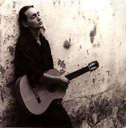 Vicente Amigo is a _______ composer and virtuoso guitarist ?