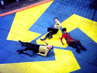  What was the episode that Uhura,Kirk and Chekov are kidnaped por aliens?
