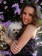  What is Emily Osment's pet dog's name?