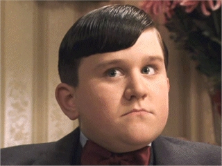  Dudley Dursley's hair is brown in the movies. What colour is it in the books?