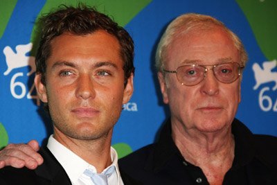  In which two sinema did Jude Law play roles originally played kwa Michael Caine?