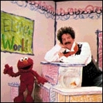  Who is with Elmo in this picture?