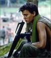 Depp's career in film continued in 1986 with an appearance in the Vietnam war film 'Platoon'. Who directed Depp in this modern war epic?