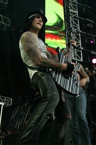  What was one of the first songs that Syn learned to play on the guitar?