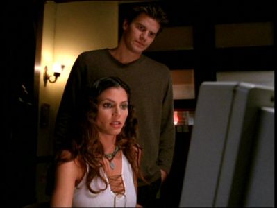  What are Angel and Cordelia searching for in this scene?