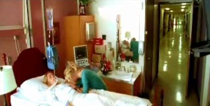  Claire breaks down at her mother's bedside.