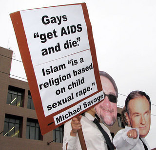  A protest sign Petikan Michael Savage's opinions on gays and Islam.