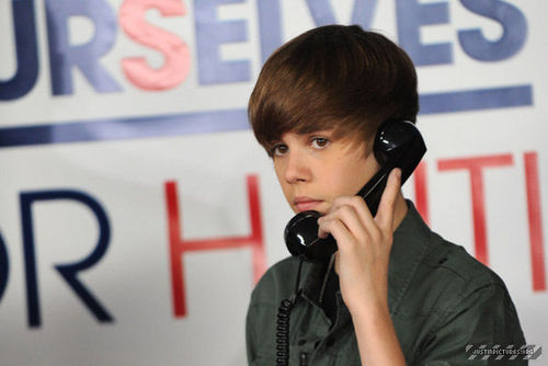  J.Bieber with a phone{hope for haití}
