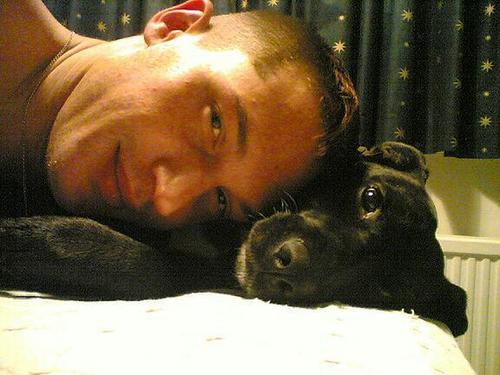  Tom loves his dog Max