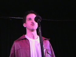  Eric Millegan bernyanyi