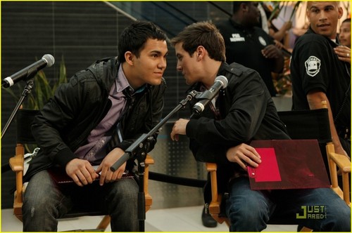  Logan whispering to Carlos