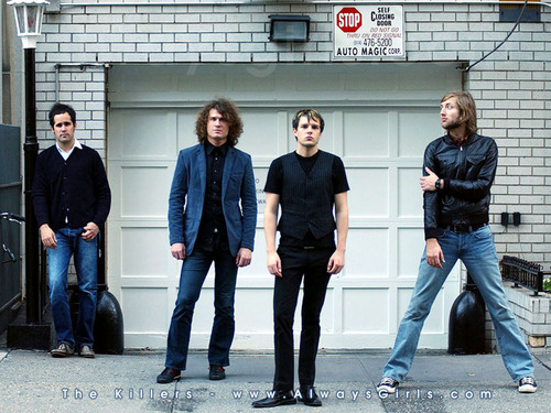  The Killers... Standing in front of a garage.