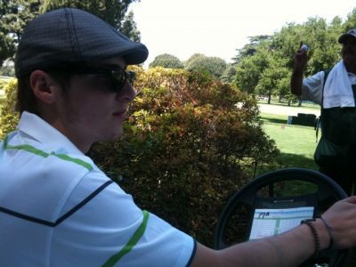 Kendall in a golf cart