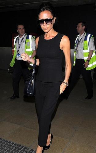  Victoria Beckham arriving at Heathrow (May 4)