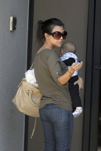  Kourtney heaing to a meeting with baby Mason 24th May,2010