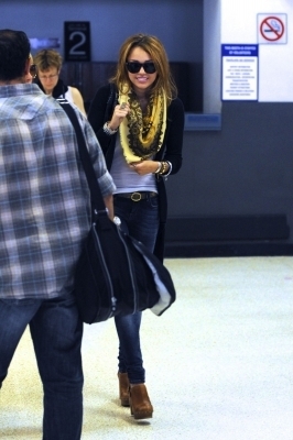  Miley Cyrus arriving at LAX Airport (6.7.10)