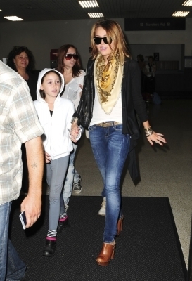 Miley Cyrus arriving at LAX Airport (6.7.10)