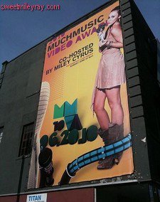  miley cyrus host poster much musique video awards