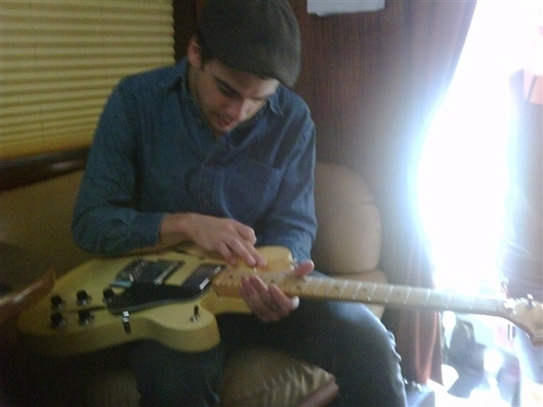  "Taylor bought his dream گٹار in Copenhagen. Its a Fender Starcaster."