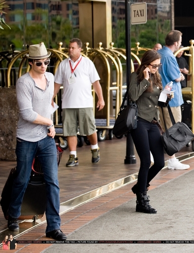 Ian and Nina leaving their hotel