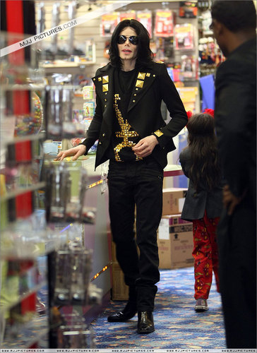 Michael shopping with his kids at Tom's Toys