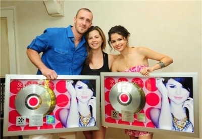  Selena celebrating "Kiss and Tell" Going Gold!
