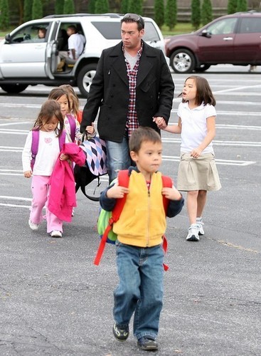  jon picing up his kids from the bus stop