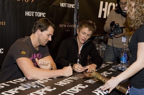  Daniel signing autographs