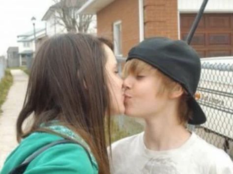 Rebecca and Justin kissing (old photo)