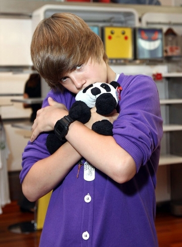  Justin Bieber with a stuffed panda!!!!