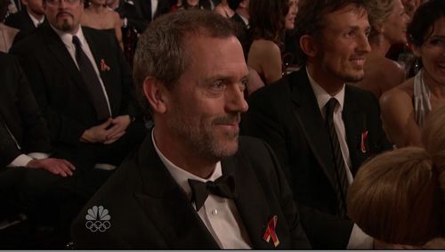  Lisa laughing with Hugh at the GG's 2010