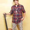 Justin Bieber and his guitar (at a photoshoot) selena4011 photo