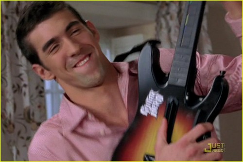 Phelps doing Guitar Hero