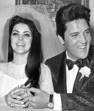  Elvis and Prescilla at their wedding