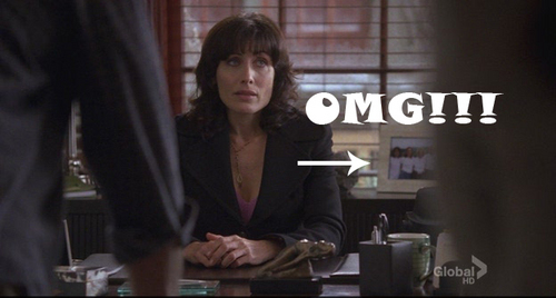 Photo of Lisa E and her family on Cuddy's desk!