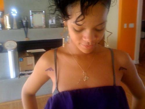  Rihanna's New Gun Tattoos