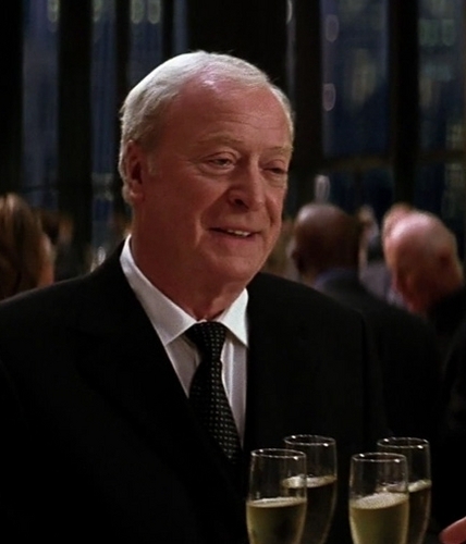  Michael as Alfred in The Dark Knight